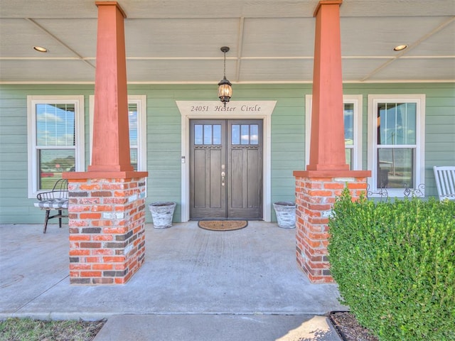 24051 Hester Cir, Washington, OK 73093 - doorway to property featuring a porch