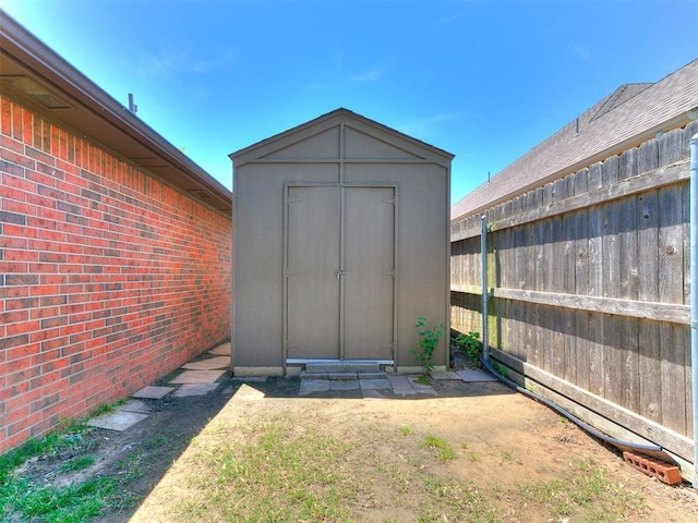 4105 Nailon Dr, Norman, OK 73072 - view of shed featuring fence