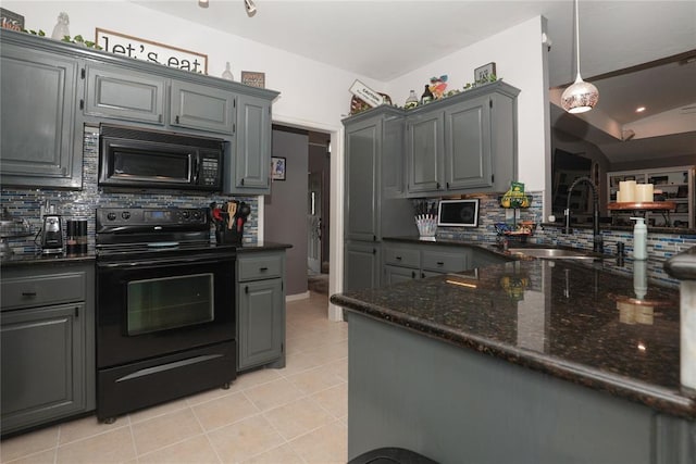 717 Vickery Ave, Yukon, OK 73099 - kitchen featuring black appliances, gray cabinets, a sink, and decorative backsplash