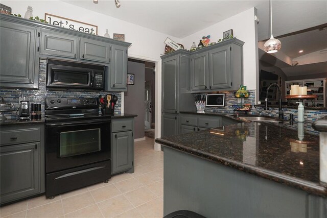 717 Vickery Ave, Yukon, OK 73099 - kitchen featuring black appliances, gray cabinets, a sink, and decorative backsplash