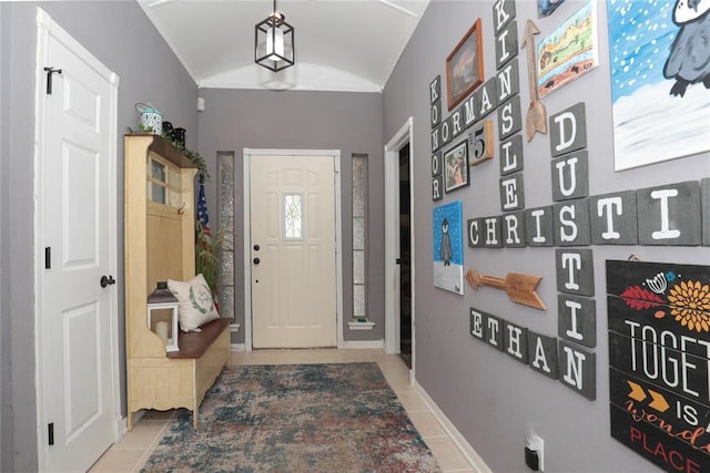 717 Vickery Ave, Yukon, OK 73099 - tiled entryway with baseboards and lofted ceiling