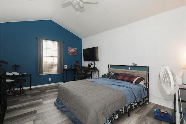 717 Vickery Ave, Yukon, OK 73099 - bedroom featuring wood finished floors, lofted ceiling, a ceiling fan, and baseboards