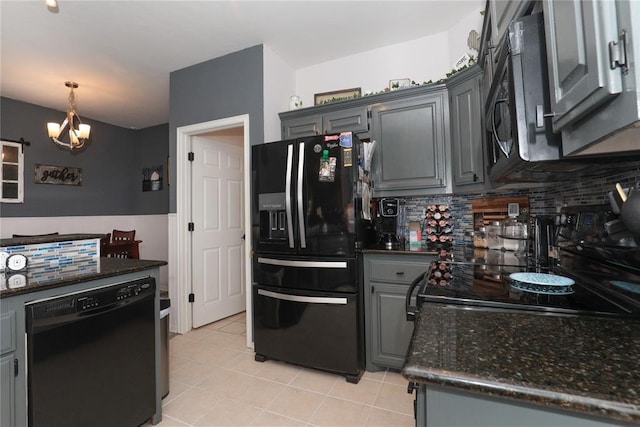 717 Vickery Ave, Yukon, OK 73099 - kitchen with black appliances, a chandelier, gray cabinetry, backsplash, and light tile patterned floors