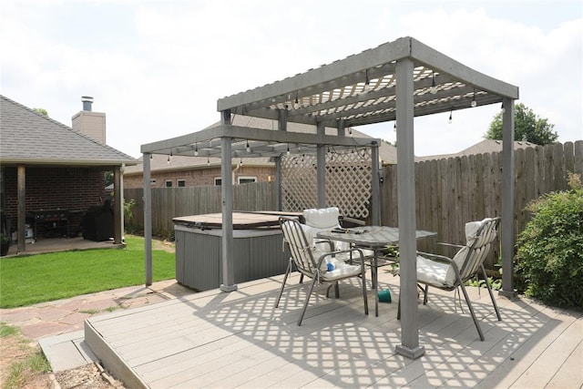 717 Vickery Ave, Yukon, OK 73099 - view of patio / terrace with a hot tub, a pergola, and a deck