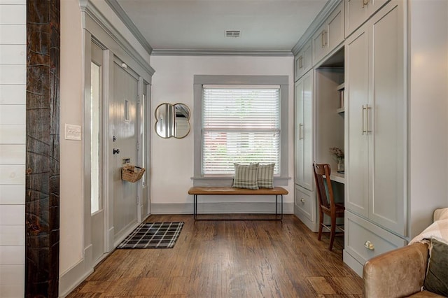 704 NW 20th St, Oklahoma City, OK 73103 - entryway with crown molding, dark wood-type flooring, and baseboards