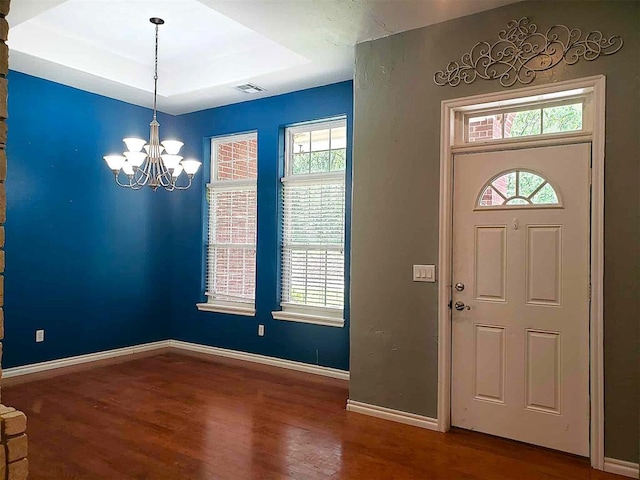 7336 E 136th Rd, Holdenville, OK 74848 - foyer entrance with a chandelier, wood finished floors, and baseboards