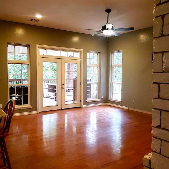 7336 E 136th Rd, Holdenville, OK 74848 - doorway to outside featuring french doors, a ceiling fan, baseboards, and wood finished floors