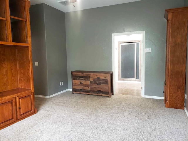 7336 E 136th Rd, Holdenville, OK 74848 - unfurnished room featuring carpet floors and baseboards