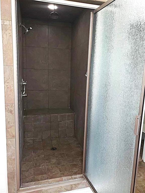 7336 E 136th Rd, Holdenville, OK 74848 - bathroom with a stall shower