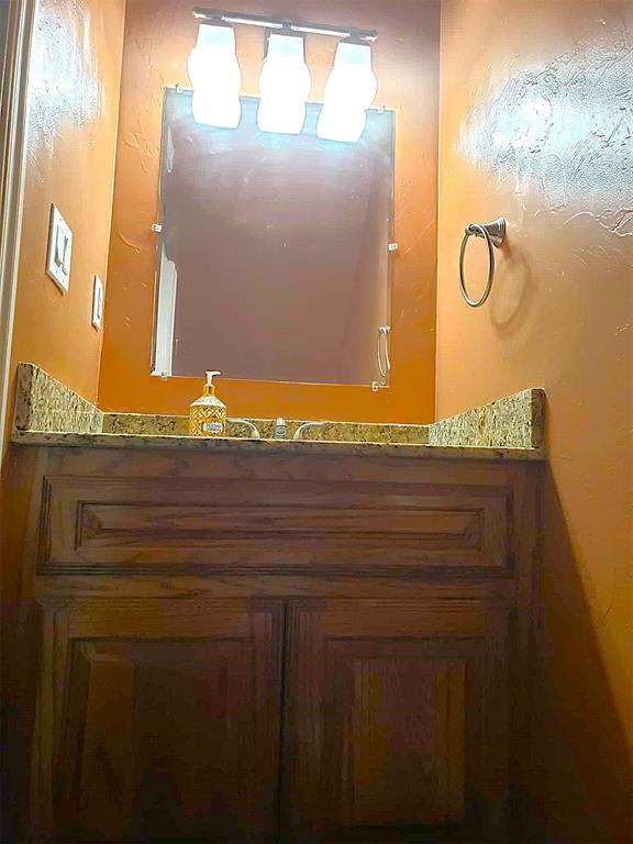 7336 E 136th Rd, Holdenville, OK 74848 - bathroom featuring vanity