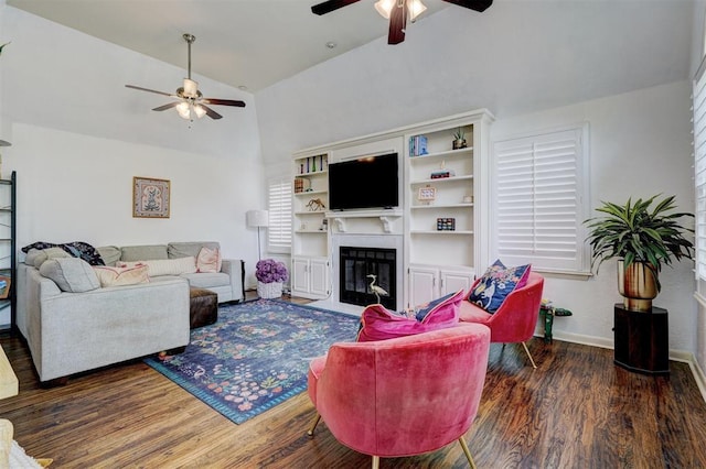 3104 NW 21st St, Oklahoma City, OK 73107 - living area with ceiling fan, wood finished floors, a fireplace with flush hearth, and high vaulted ceiling