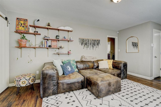 3104 NW 21st St, Oklahoma City, OK 73107 - living area with wood finished floors and a barn door