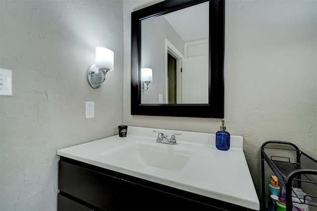 3104 NW 21st St, Oklahoma City, OK 73107 - bathroom with vanity and a textured wall