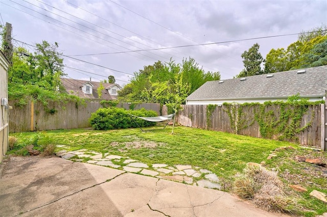 3104 NW 21st St, Oklahoma City, OK 73107 - fenced backyard with a patio area