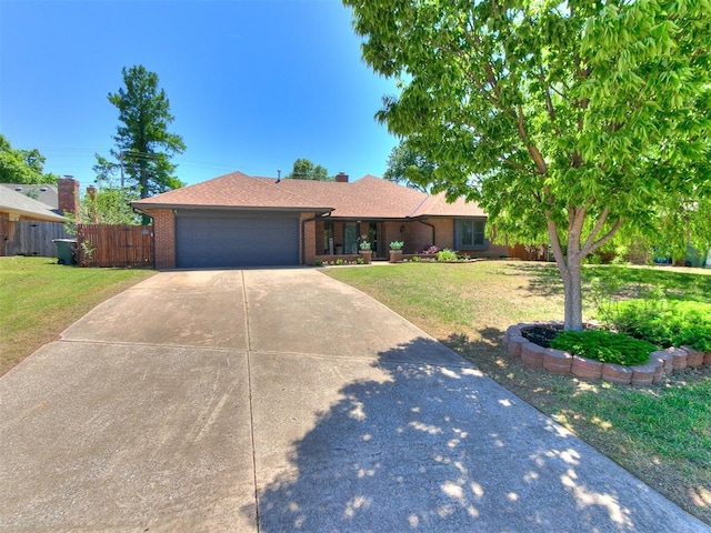 1400 Brookhaven Dr, Edmond, OK 73034 - ranch-style home with concrete driveway, a garage, brick siding, and roof with shingles