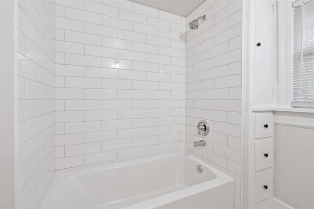 2321 NW 25th St, Oklahoma City, OK 73107 - full bath featuring tub / shower combination and baseboards