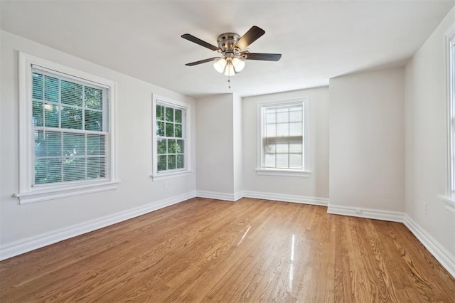 2321 NW 25th St, Oklahoma City, OK 73107 - unfurnished room featuring light wood-style flooring, baseboards, and ceiling fan