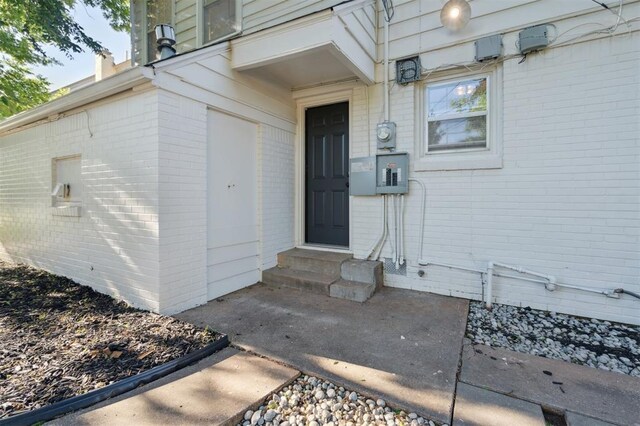 2321 NW 25th St, Oklahoma City, OK 73107 - entrance to property with brick siding and electric panel