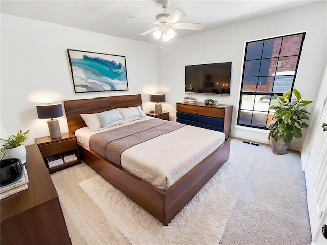 bedroom featuring carpet flooring and a ceiling fan
