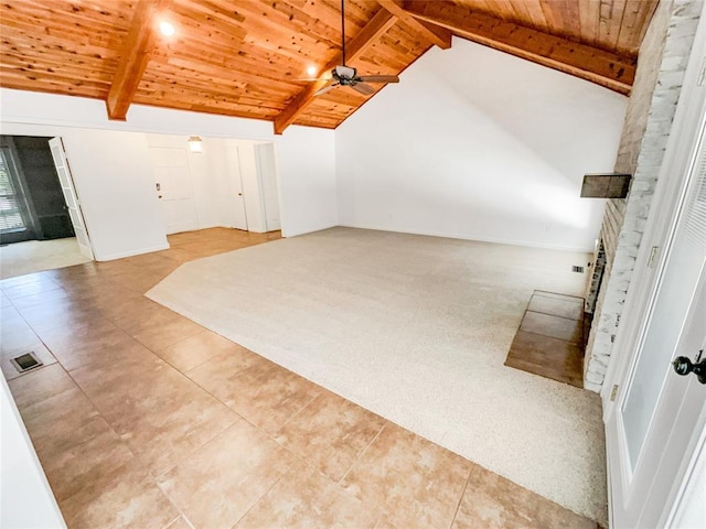 bonus room featuring wood ceiling, a brick fireplace, a ceiling fan, tile patterned flooring, and carpet flooring