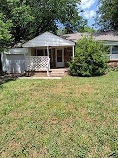 409 W Johnson St, Norman, OK 73069 - view of green lawn with covered porch