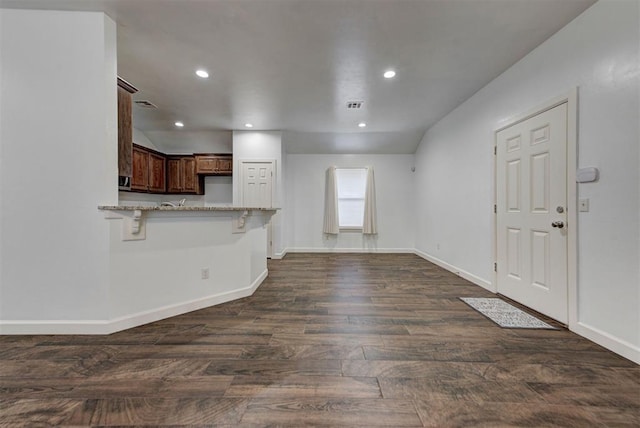 316 SW 4th Pl, Newcastle, OK 73065 - unfurnished living room featuring dark wood-type flooring, baseboards, and recessed lighting