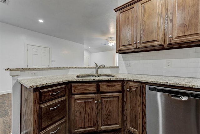 316 SW 4th Pl, Newcastle, OK 73065 - kitchen with dishwasher, a sink, light stone countertops, backsplash, and recessed lighting