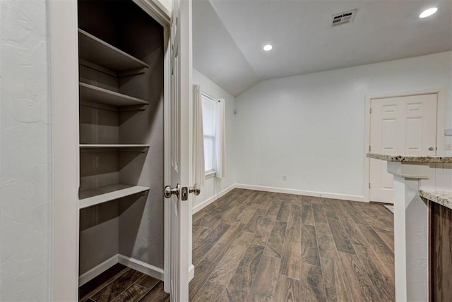 316 SW 4th Pl, Newcastle, OK 73065 - unfurnished living room featuring dark wood-style flooring, vaulted ceiling, baseboards, and recessed lighting