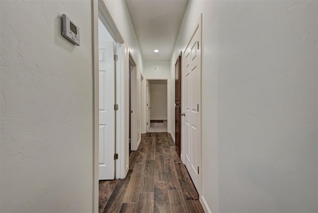 316 SW 4th Pl, Newcastle, OK 73065 - hall featuring dark wood-type flooring and baseboards