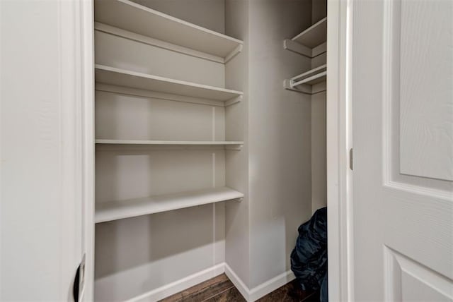 316 SW 4th Pl, Newcastle, OK 73065 - walk in closet with dark wood finished floors