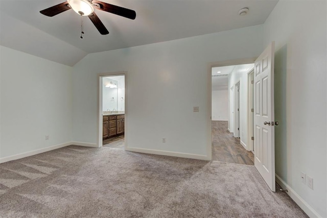 316 SW 4th Pl, Newcastle, OK 73065 - empty room featuring light carpet, ceiling fan, baseboards, lofted ceiling, and a smoke detector