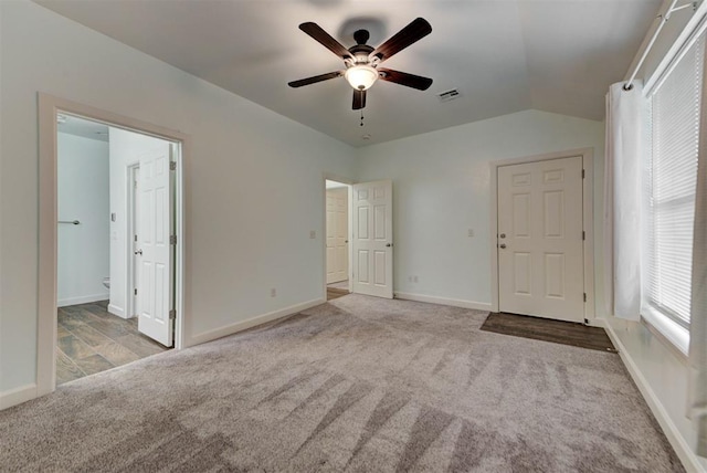 316 SW 4th Pl, Newcastle, OK 73065 - unfurnished bedroom featuring carpet, baseboards, lofted ceiling, ensuite bath, and a ceiling fan
