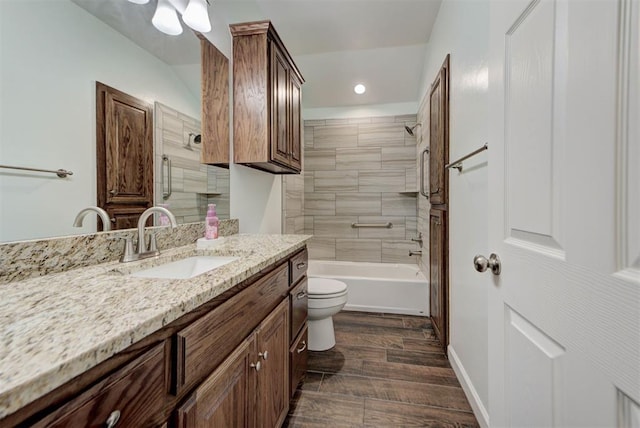 316 SW 4th Pl, Newcastle, OK 73065 - bathroom featuring vanity, toilet, wood finished floors, bathtub / shower combination, and baseboards