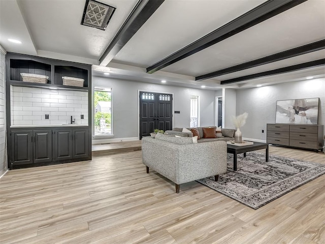 11008 Blue Sage Rd, Oklahoma City, OK 73120 - living area featuring light wood-type flooring, baseboards, beam ceiling, and recessed lighting