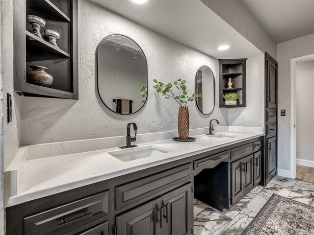 11008 Blue Sage Rd, Oklahoma City, OK 73120 - full bath featuring double vanity and marble finish floors