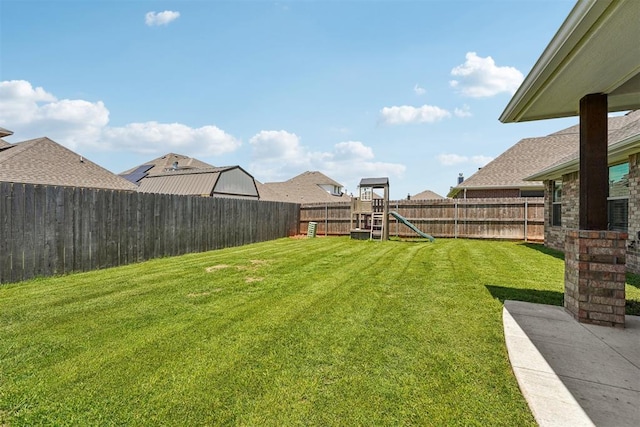 view of yard with a playground