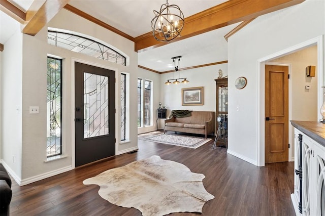 13500 Creekside Dr, Oklahoma City, OK 73131 - foyer entrance featuring a chandelier, dark wood finished floors, baseboards, and crown molding