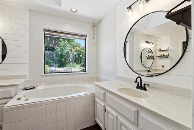 13500 Creekside Dr, Oklahoma City, OK 73131 - full bath featuring vanity and a garden tub