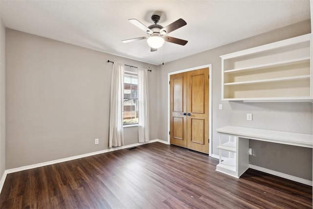 13500 Creekside Dr, Oklahoma City, OK 73131 - unfurnished office with a ceiling fan, wood finished floors, and baseboards