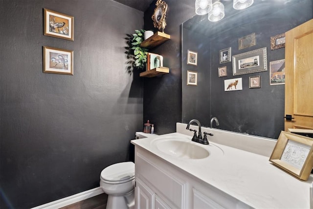 13500 Creekside Dr, Oklahoma City, OK 73131 - half bathroom featuring vanity and toilet