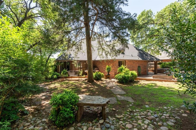 13500 Creekside Dr, Oklahoma City, OK 73131 - rear view of property with a deck and brick siding
