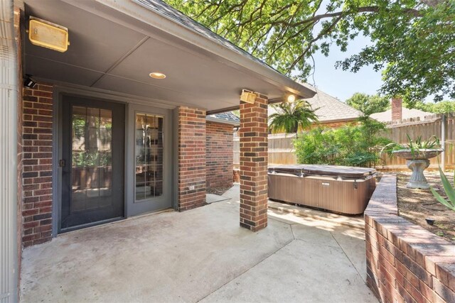 13500 Creekside Dr, Oklahoma City, OK 73131 - view of patio / terrace with a hot tub