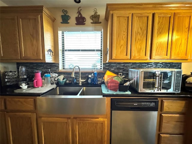 142 Skyline Dr, Chickasha, OK 73018 - kitchen featuring stainless steel dishwasher, brown cabinets, and decorative backsplash