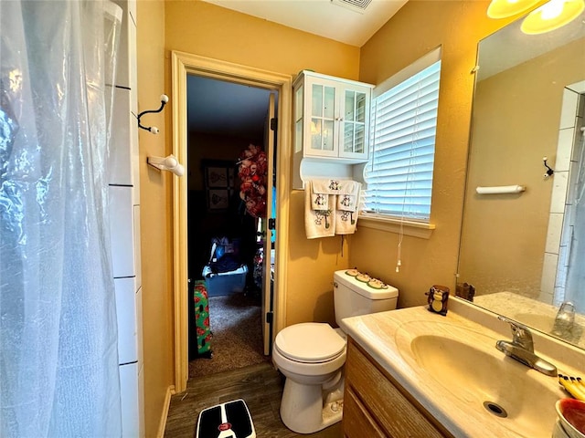 142 Skyline Dr, Chickasha, OK 73018 - full bathroom with vanity, toilet, and a shower with curtain