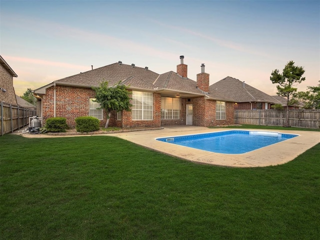 16104 Ledge Ln, Edmond, OK 73013 - view of pool at dusk
