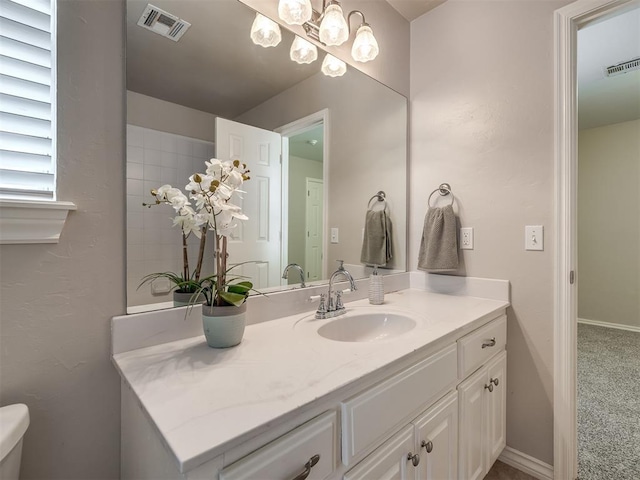 16104 Ledge Ln, Edmond, OK 73013 - bathroom featuring vanity and toilet