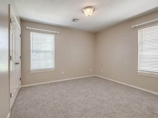 16104 Ledge Ln, Edmond, OK 73013 - carpeted empty room with baseboards