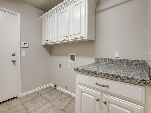 16104 Ledge Ln, Edmond, OK 73013 - laundry room featuring washer hookup, cabinet space, hookup for an electric dryer, baseboards, and hookup for a gas dryer