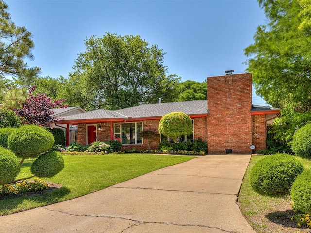 1738 Westchester Dr, Oklahoma City, OK 73120 - ranch-style home with driveway, a chimney, brick siding, and a front lawn