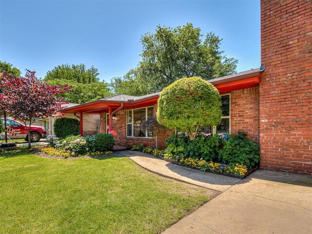 1738 Westchester Dr, Oklahoma City, OK 73120 - view of front of property featuring brick siding and a front lawn